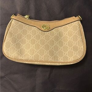 Tan Monogram clutch bag with Gold Details